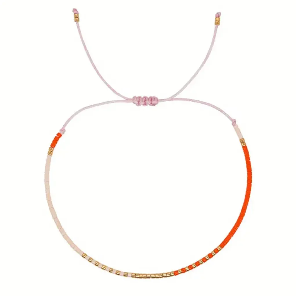 perlenarmband_im_boho_sti_0.webp noord® Perlenarmband im Boho Stil orange, rosé, gold